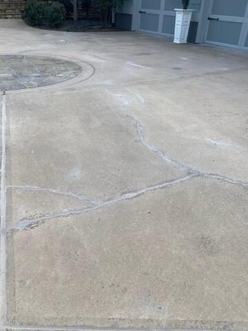 After driveway concrete crack close up