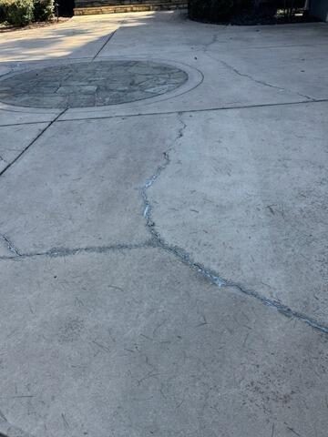 Before driveway concrete crack close up